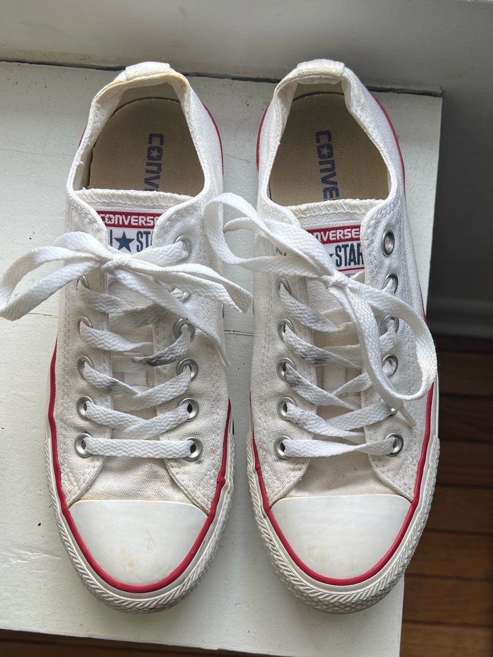 Worn Converse White Low Top Sneakers